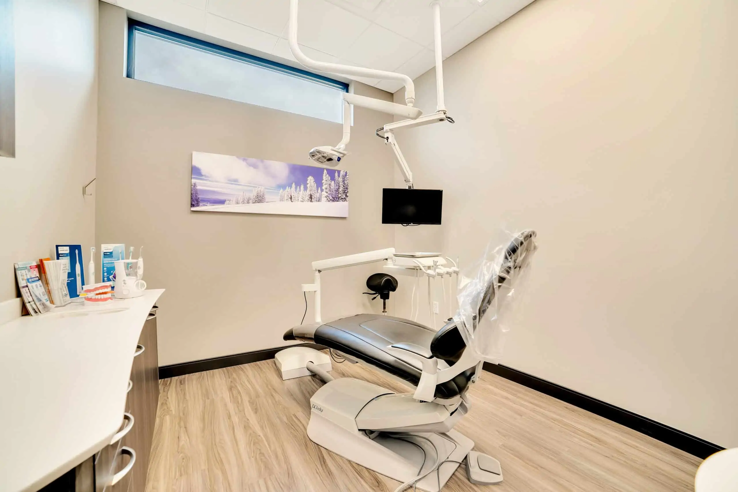 A modern-looking dental examination room at Signature Dentistry of Arvada