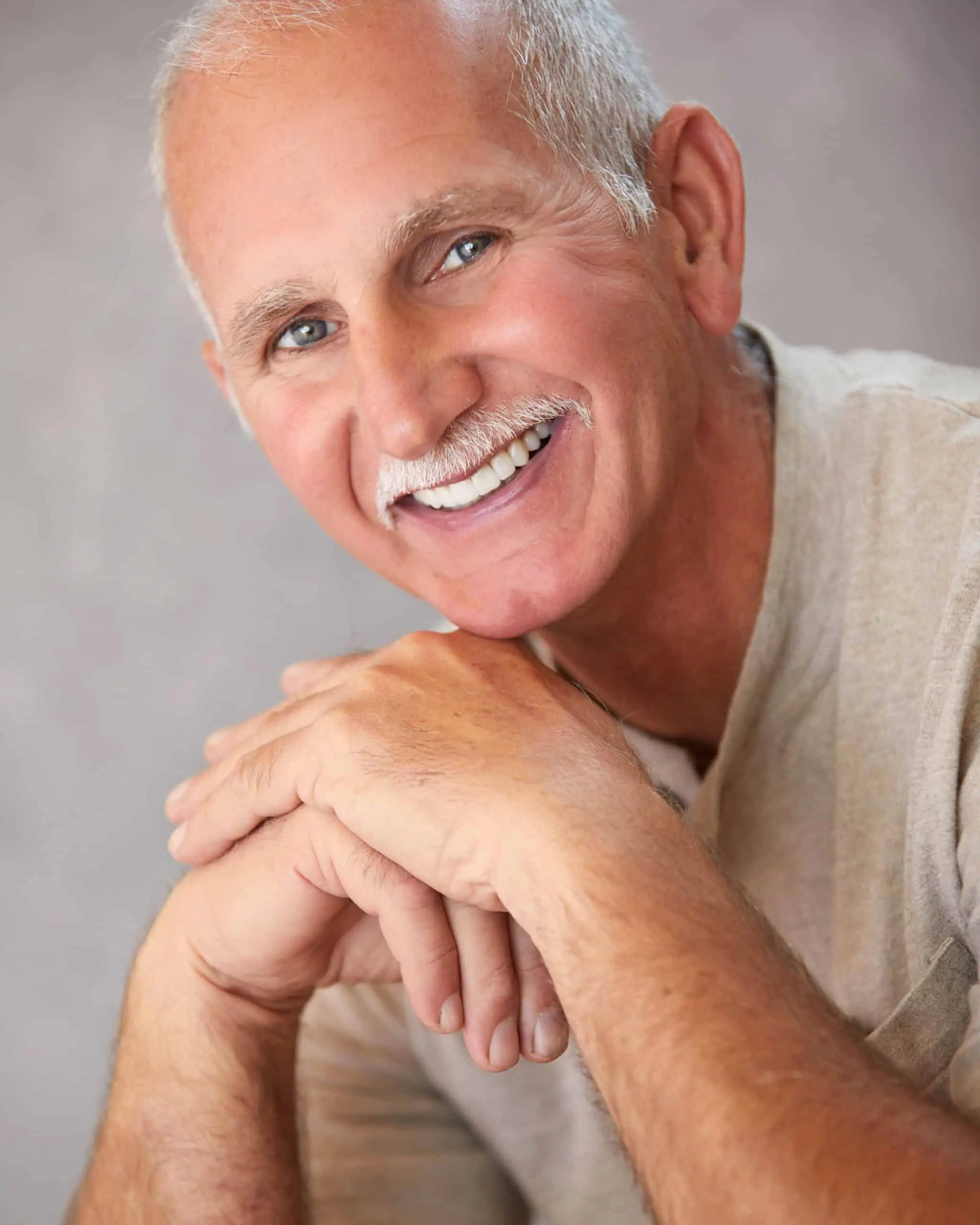 A Signature Dentistry of Arvada patient smiling brightly