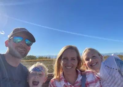 Dr. Woods with his family enjoying a nice day outside