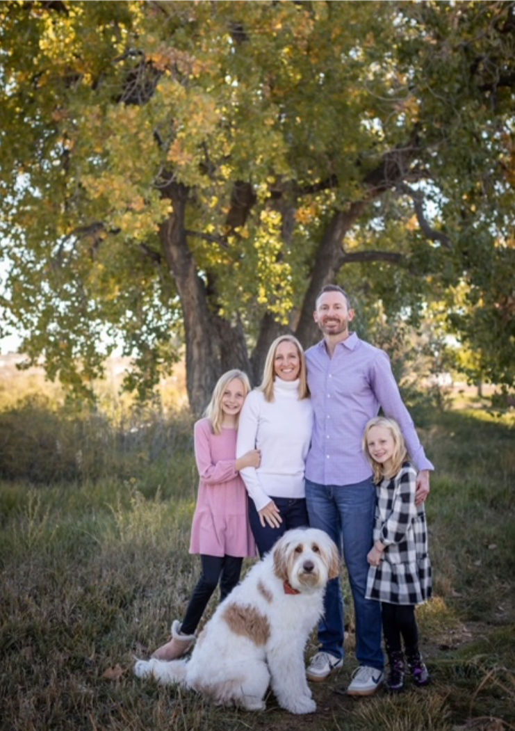 Morgan Woods with her husband, two children, and family dog